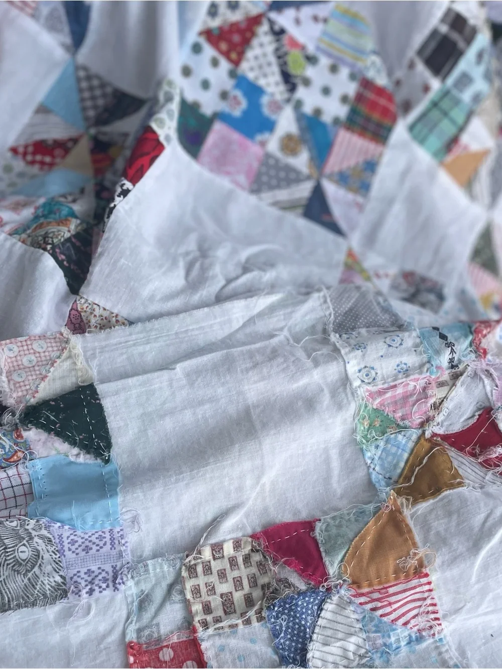 Handmade Hand stitched  White Patchwork Quilt with Multicolored Squares.
